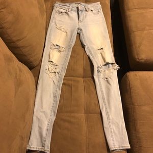 Light blue ripped jeans